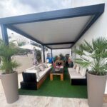 Pérgola bioclimática adosada